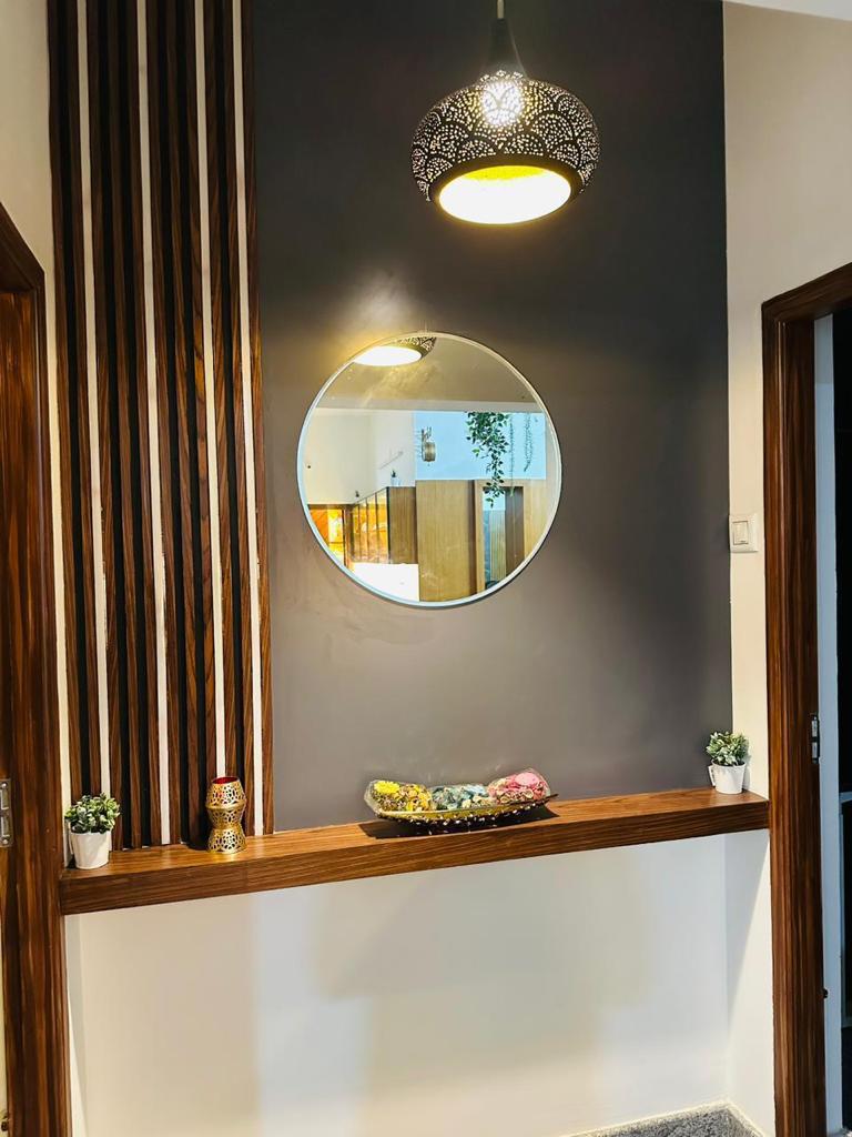 Completed foyer mirror and joinery detailing in a Bengaluru home