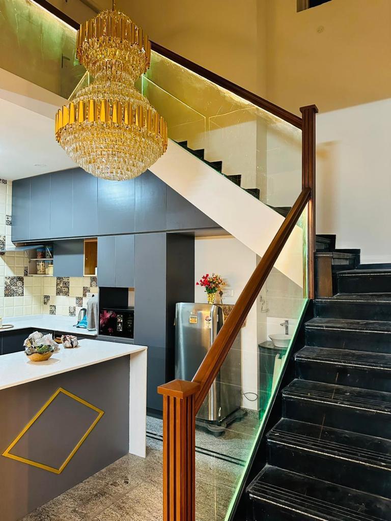 Villa Residence staircase and kitchen interior Bengaluru