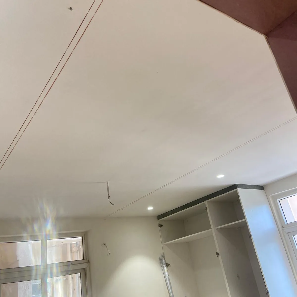 Aditya Empress apartment interiors in Hyderabad by AlcorOne Solutions — Wardrobe carcass during installation
