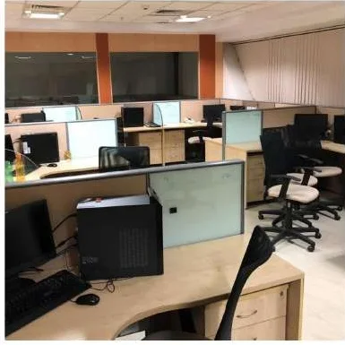 KG360 office fit-out Chennai by AlcorOne Solutions — workstation row with monitors