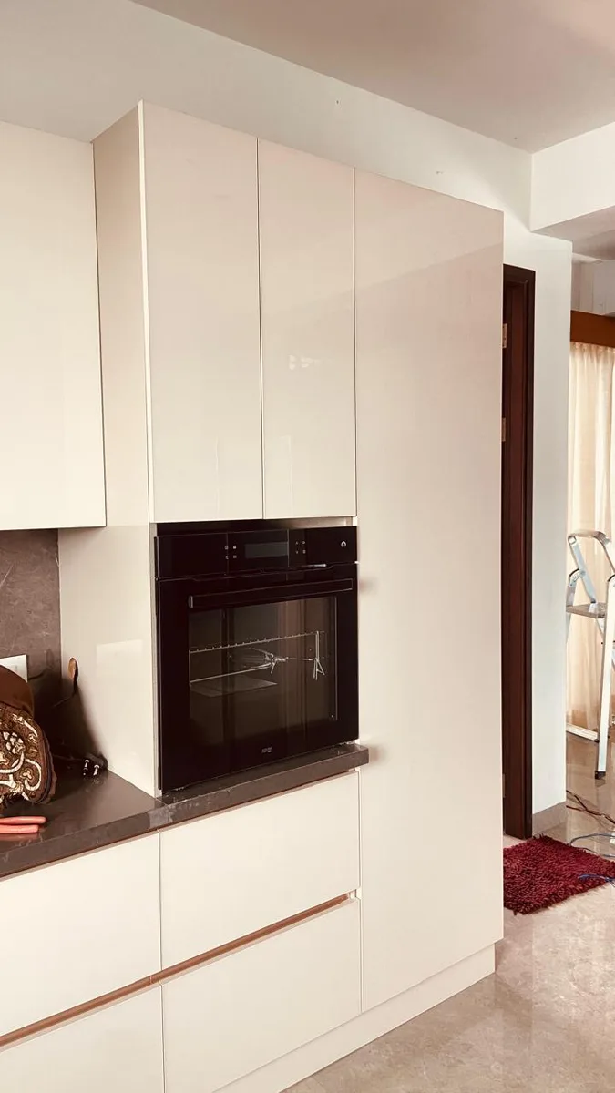 EIPL La Paloma duplex interior in Hyderabad by AlcorOne Solutions — Kitchen tall units & oven