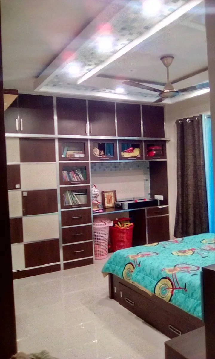 Ozone home interiors in Chennai by AlcorOne Solutions — Bedroom & study