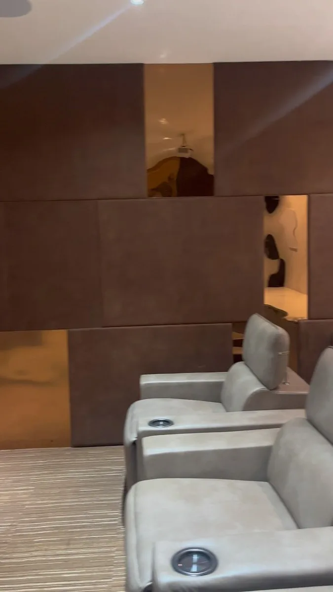 Serene 3BHK Residence interior in Hyderabad by AlcorOne Solutions — Home theatre