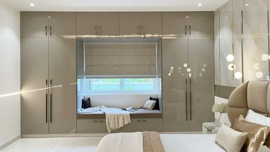 Serene 3BHK Residence interior in Hyderabad by AlcorOne Solutions — Wardrobe with window seat