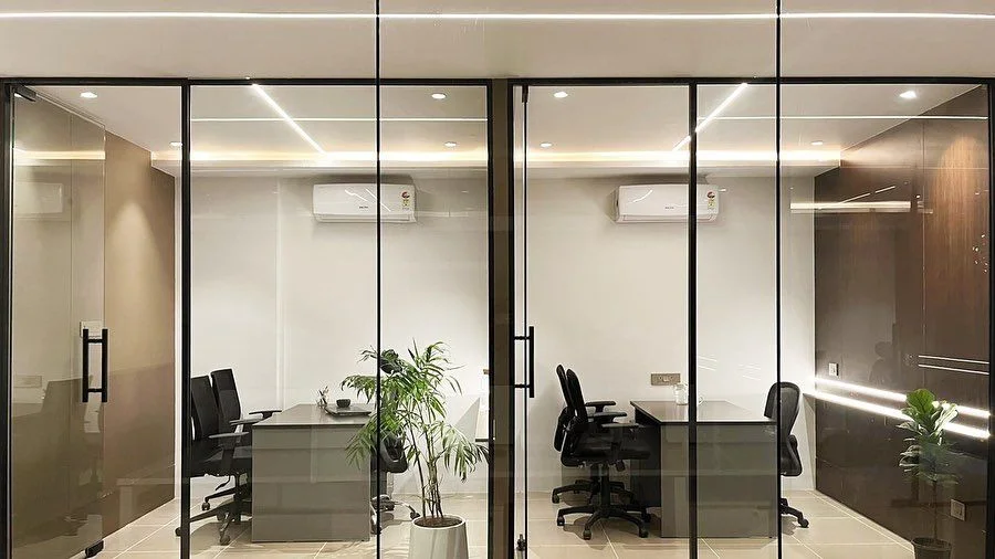 Vedant Petrochem office fit-out Hyderabad by AlcorOne Solutions — black-frame glass cabins