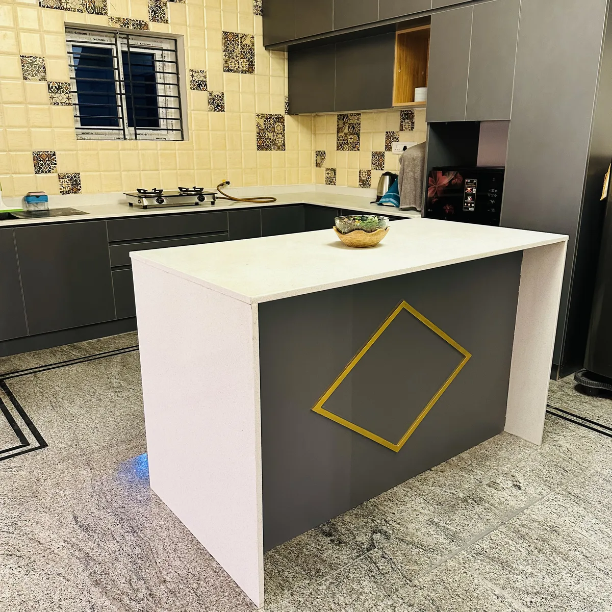 Villa interior in Bengaluru by AlcorOne Solutions — Island modular kitchen