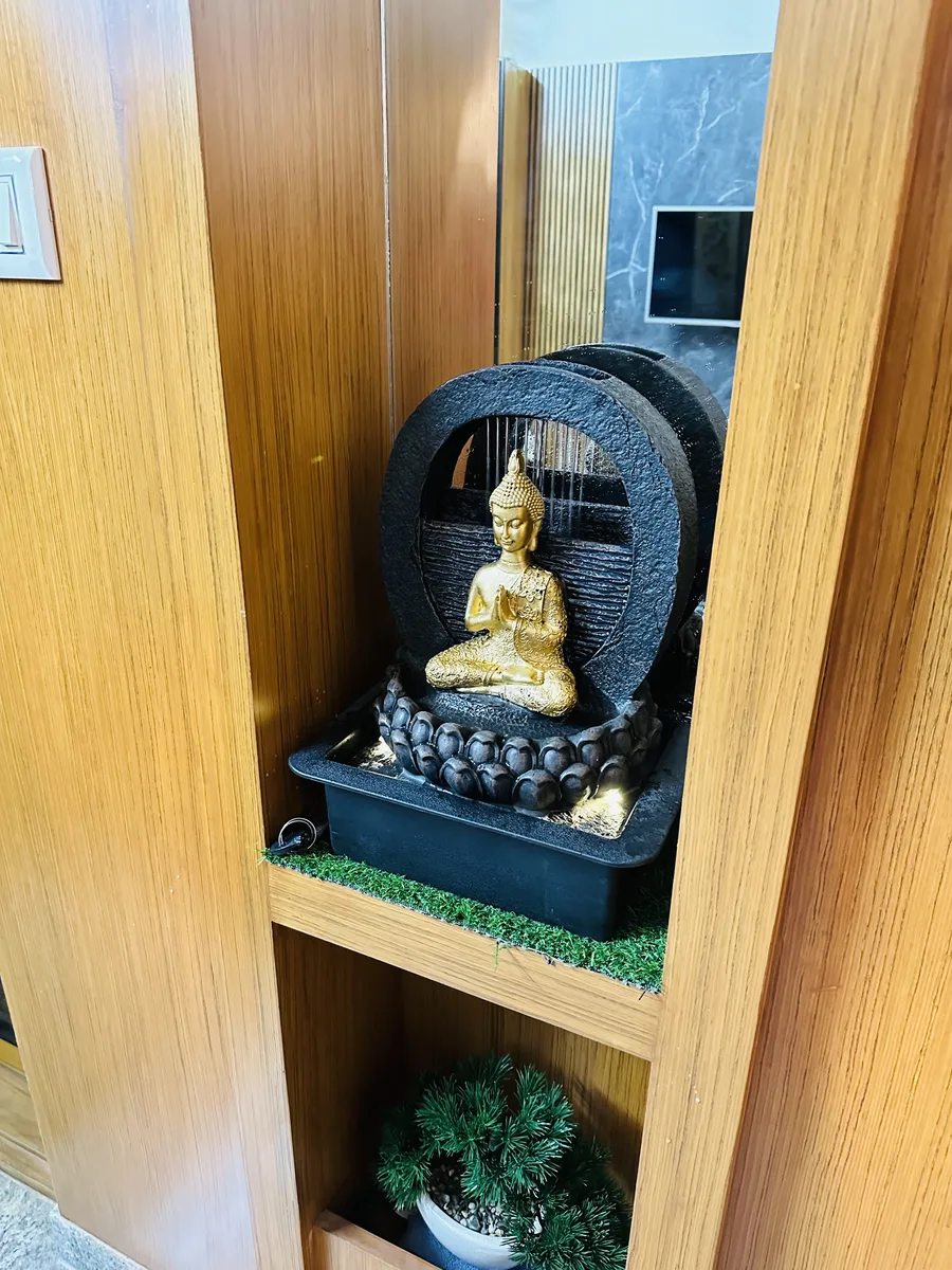 Villa interior in Bengaluru by AlcorOne Solutions — Buddha fountain niche