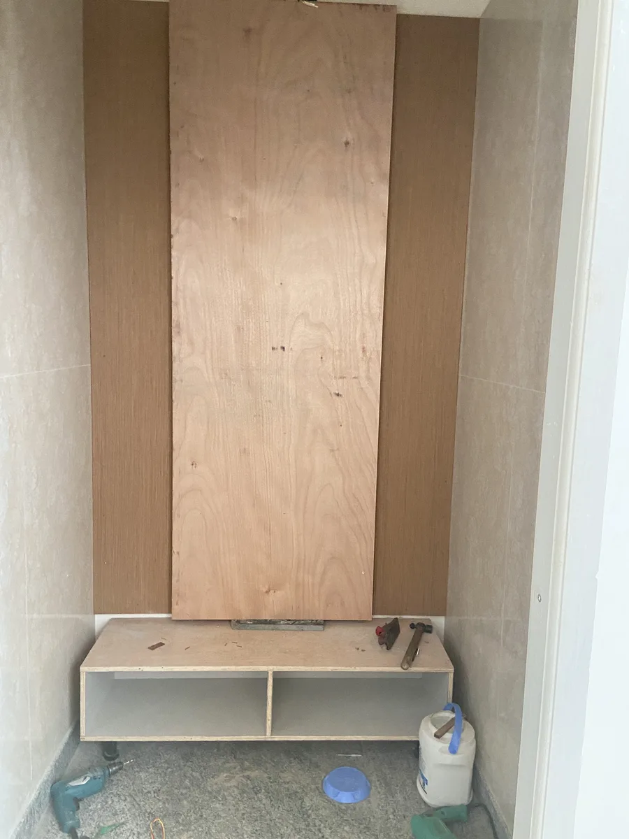 Villa interior in Bengaluru by AlcorOne Solutions — Wall panelling during installation